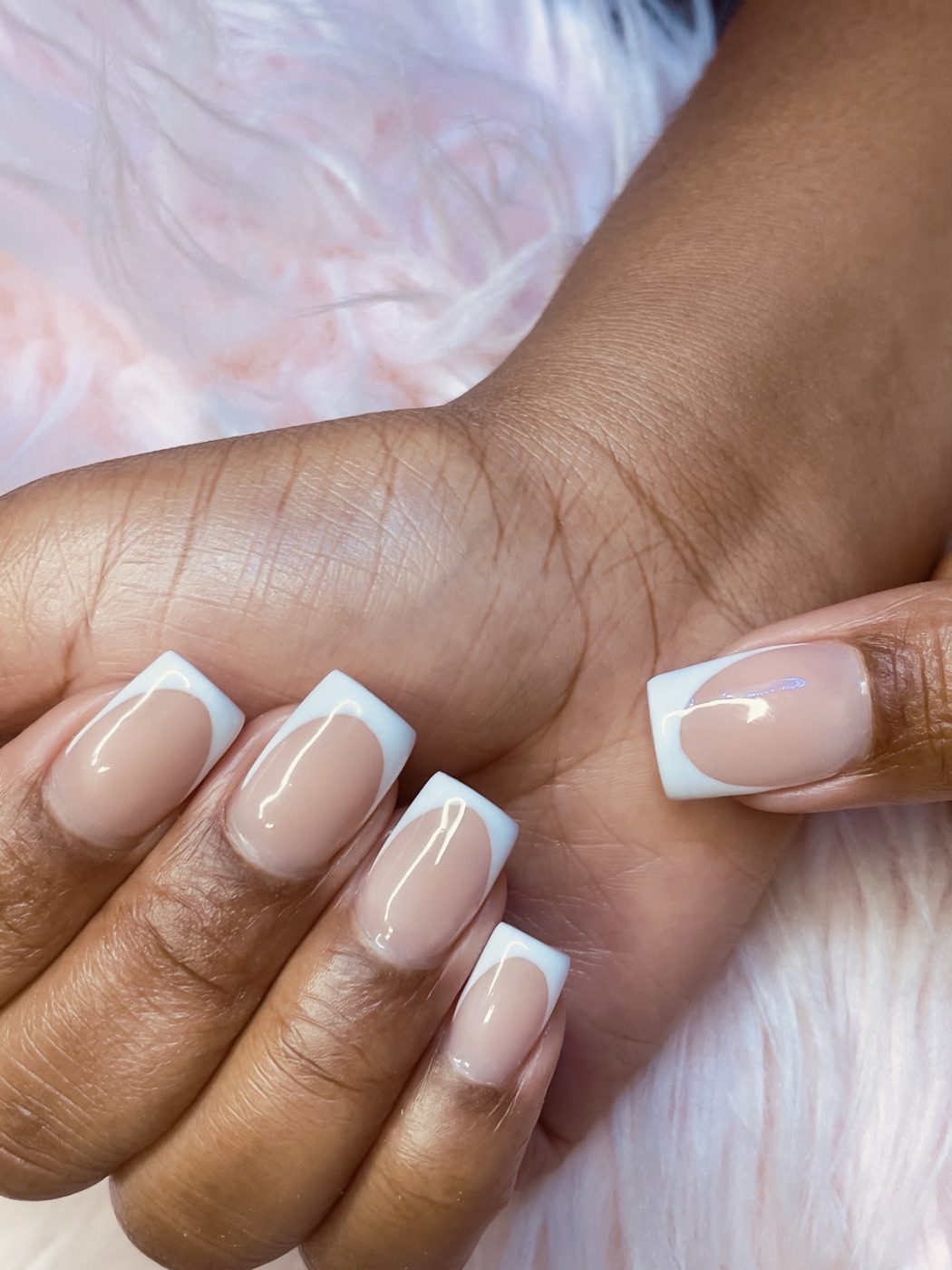 Square nude nails with crisp white French tips